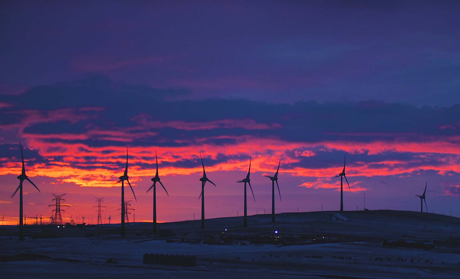 Wind turbines at sunset